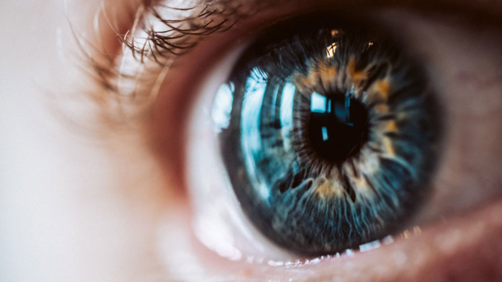 extreme-closeup-enlarged-human-eye-with-beautiful-colors